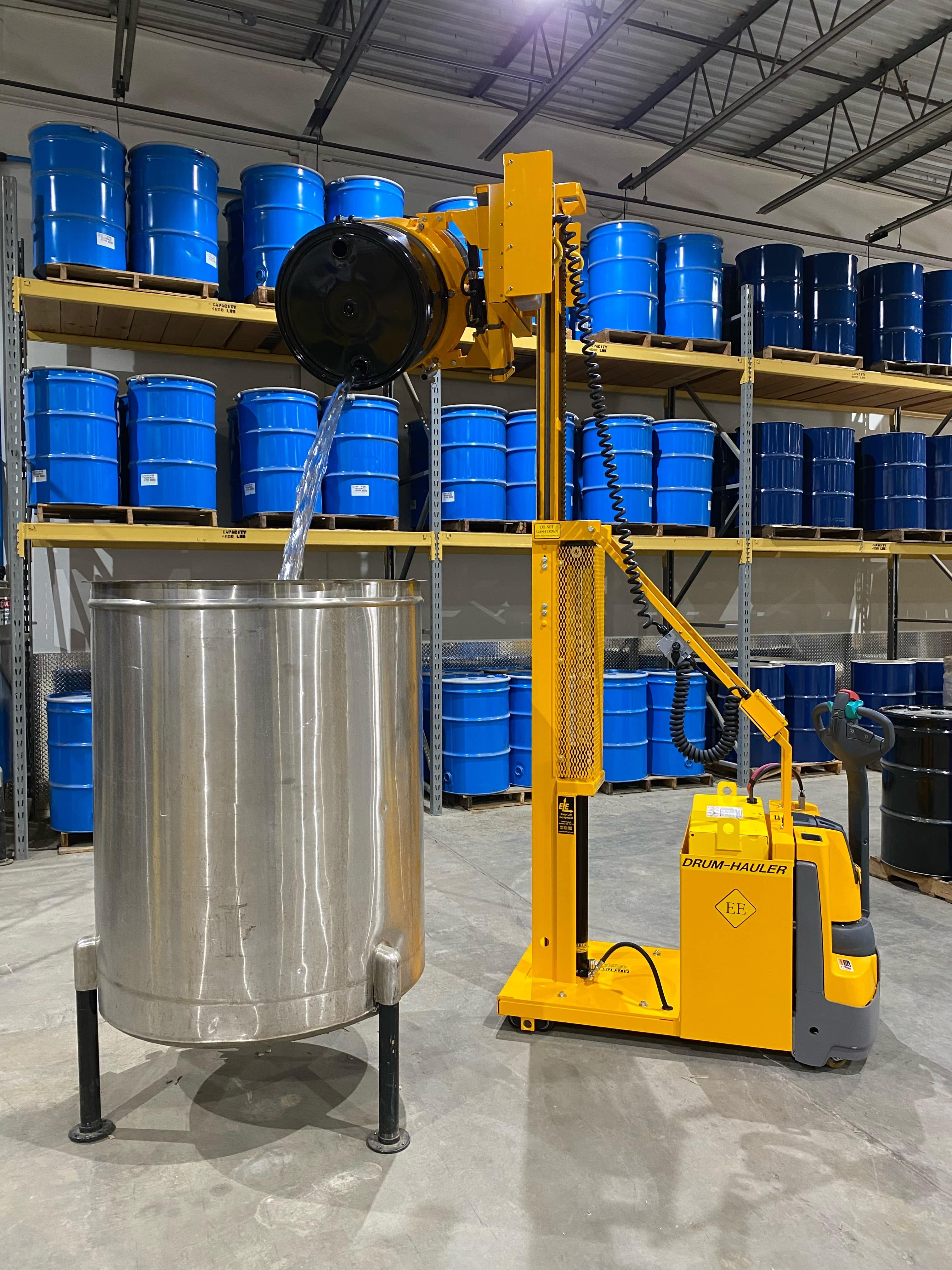 04-Drum-Hauler-with-2-stage-Mast-and-CR-Clamp-pouring-steel-drum-min