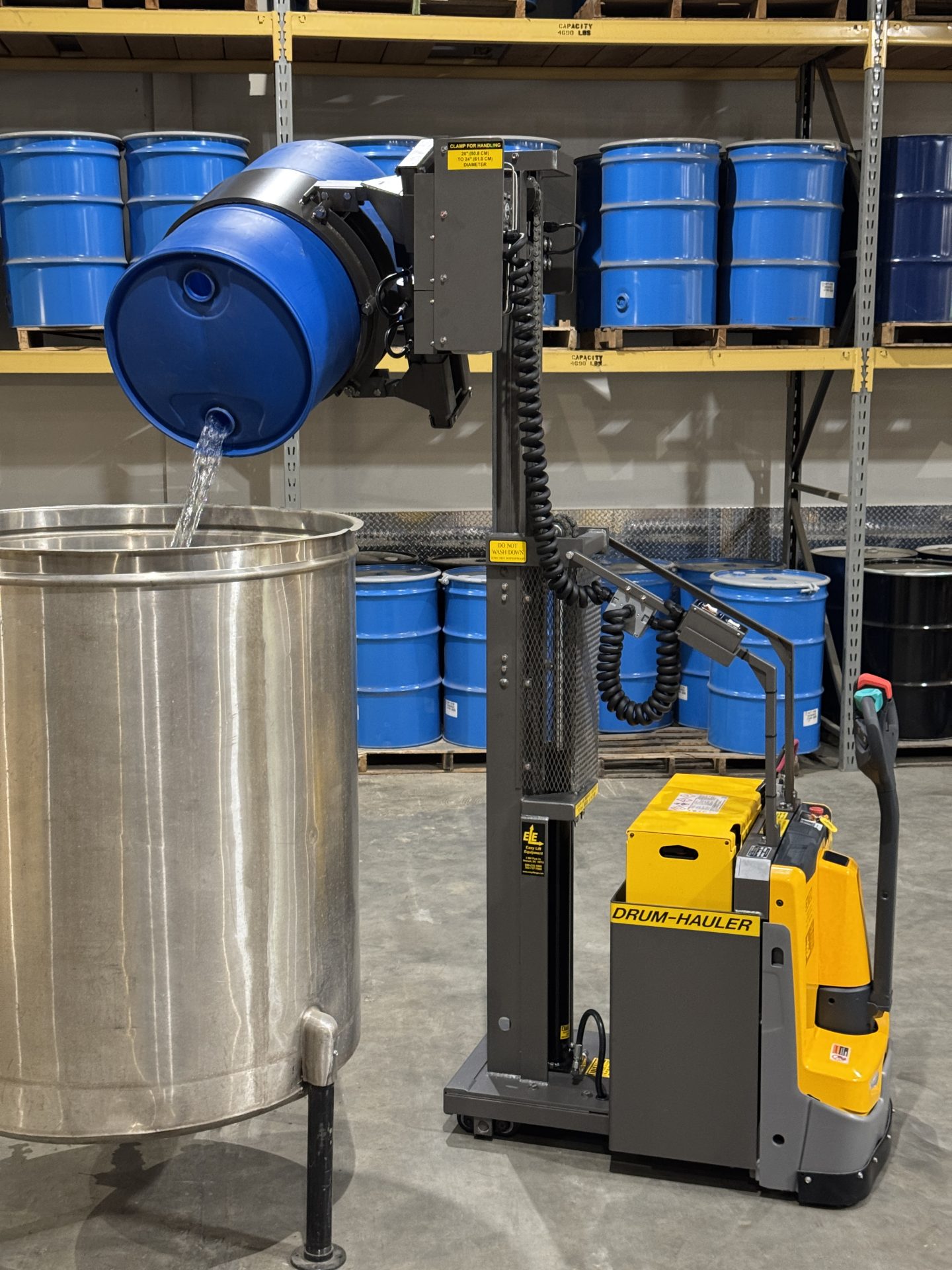 DH70072CRSP-pouring-drum-into-tank
